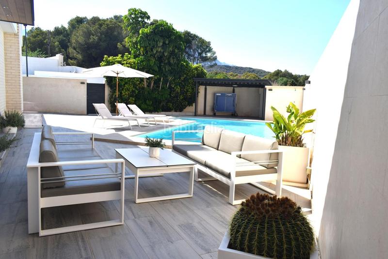 Foto ce7a37d0-4d02-472d-be62-17583b4e5c4b. Casa aparellada amb calefacció aparcament piscina a Alfàs del Pi (l´)