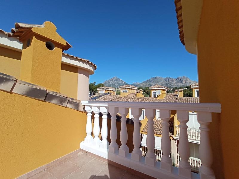 Foto 8d9d4f4f-f433-48cc-a148-e5999ada6419. Casa adosada adosado de 3 dormitorios con garaje doble y piscina a 1km del centro de alfaz del pi en Nucia (la)