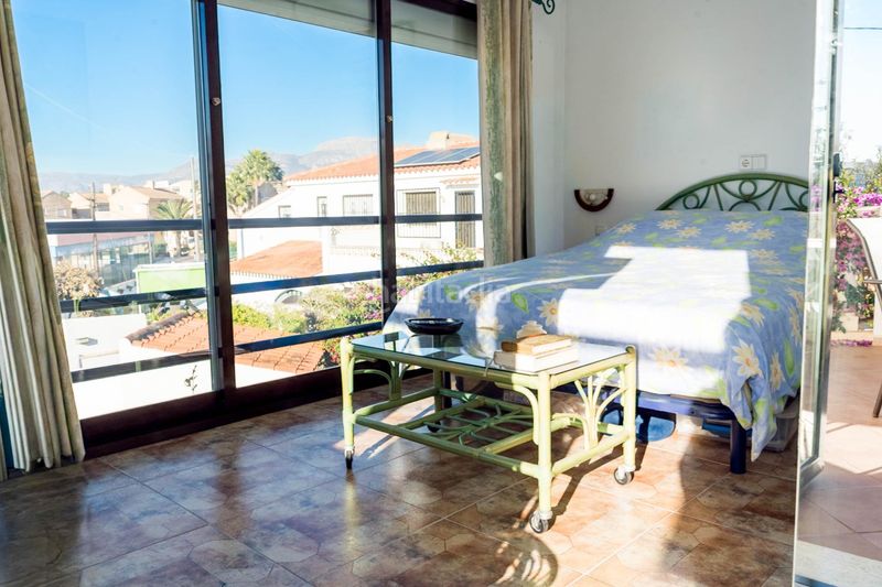 Foto 04f5244d-71c4-4b25-bf3a-b1291c85cd89. Casa aparellada amb aparcament piscina a L´Albir Alfàs del Pi (l´)