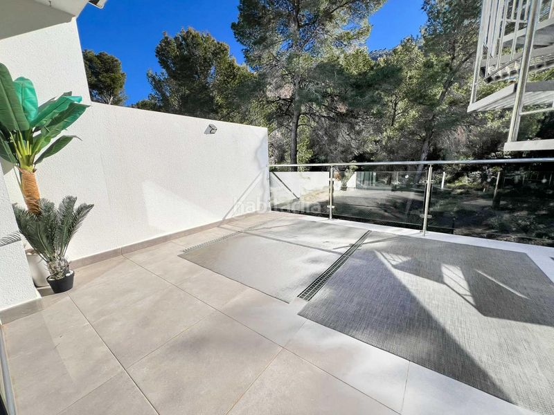 Foto 931b3b92-1fde-43ef-8138-69a914546d8c. Casa adossada amb calefacció aparcament piscina a Alfàs del Pi (l´)