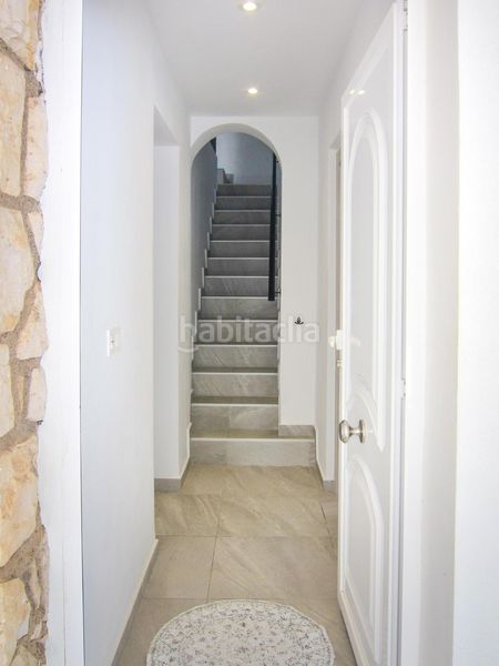 Foto 4830f2ee-dba1-49e1-b741-d5b0f261cff4. Casa aparellada amb calefacció aparcament piscina a Alfàs del Pi (l´)