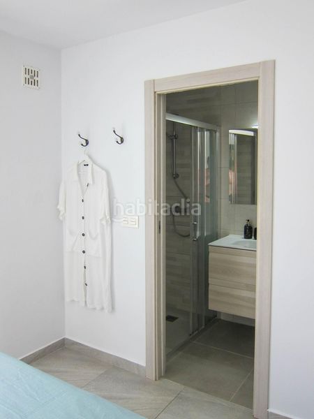 Foto 50ec034a-46a3-43b3-8956-1bcd11f09315. Casa aparellada amb calefacció aparcament piscina a Alfàs del Pi (l´)