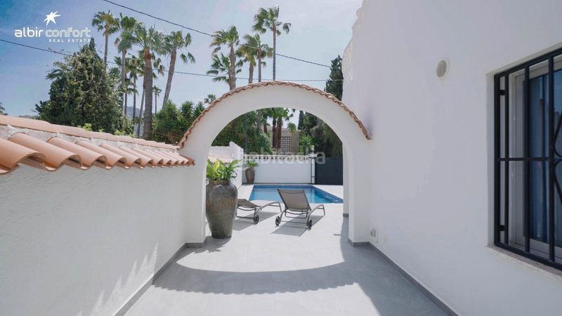 Foto 56c8bd60-6e3e-436f-8a20-8154c3c0804b. Casa aparellada amb calefacció aparcament piscina a Alfàs del Pi (l´)