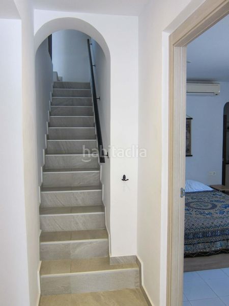 Foto 68cb0df0-c57c-4f63-9ff6-b9abd1bc00dd. Casa aparellada amb calefacció aparcament piscina a Alfàs del Pi (l´)