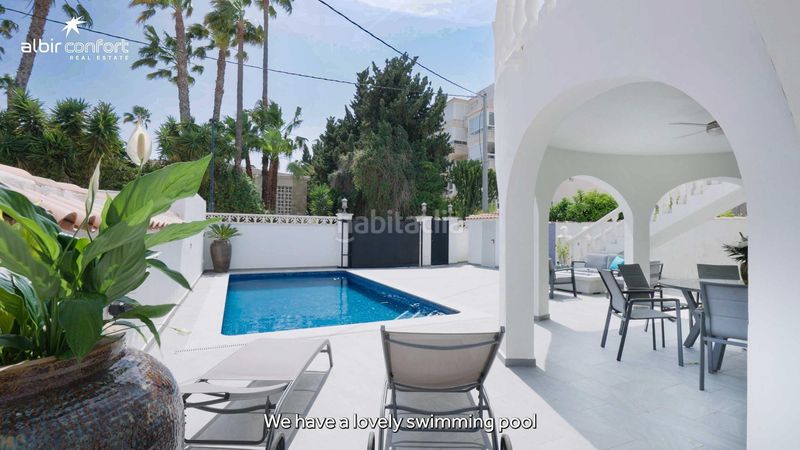 Foto 77bdb177-cfe3-4110-87f5-1e67545c0bd1. Casa aparellada amb calefacció aparcament piscina a Alfàs del Pi (l´)