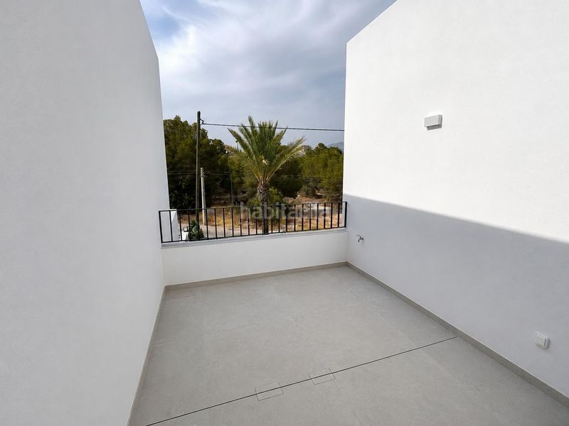 Foto 300047de-f780-42cb-9232-bc8d402bd5e6. Casa aparellada amb calefacció aparcament piscina a Alfàs del Pi (l´)