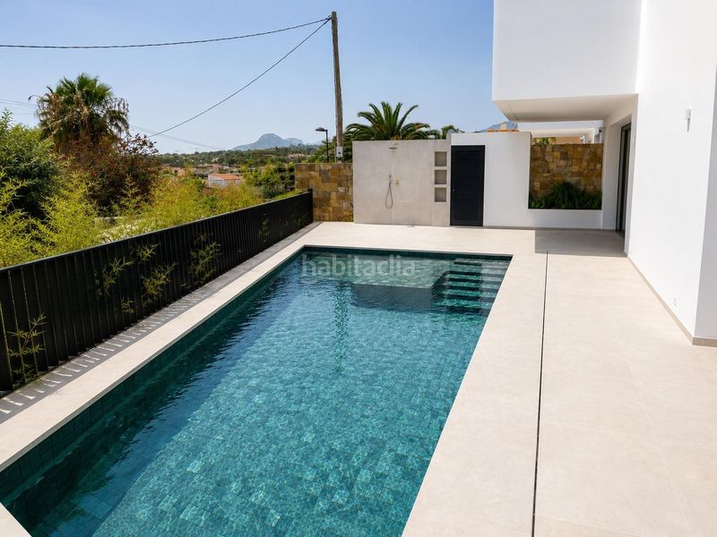Foto 5ba19f7c-0bbc-4094-bf0d-79946624fcd1. Casa aparellada amb calefacció aparcament piscina a Alfàs del Pi (l´)