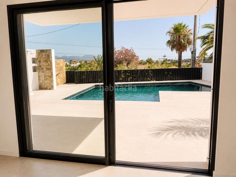 Foto ce2cfd24-d428-407a-906b-441c4886ae3a. Casa aparellada amb calefacció aparcament piscina a Alfàs del Pi (l´)