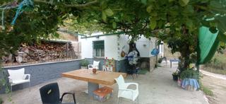 Terreny residencial a Benaocaz. Venta parcela con casa en tavizna