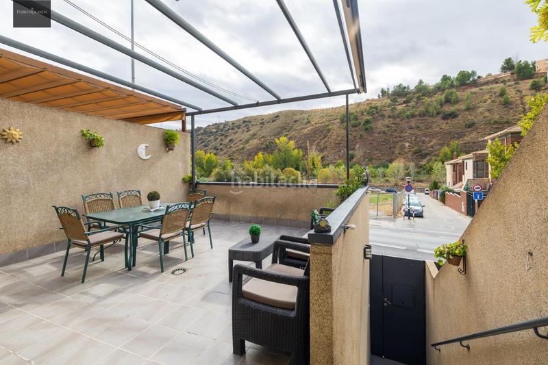 Foto 2d6bc5e2-8d10-4630-82e5-85f0a75609fd. Reihenhaus mit heizung parking in Crta. De la Sierra Granada