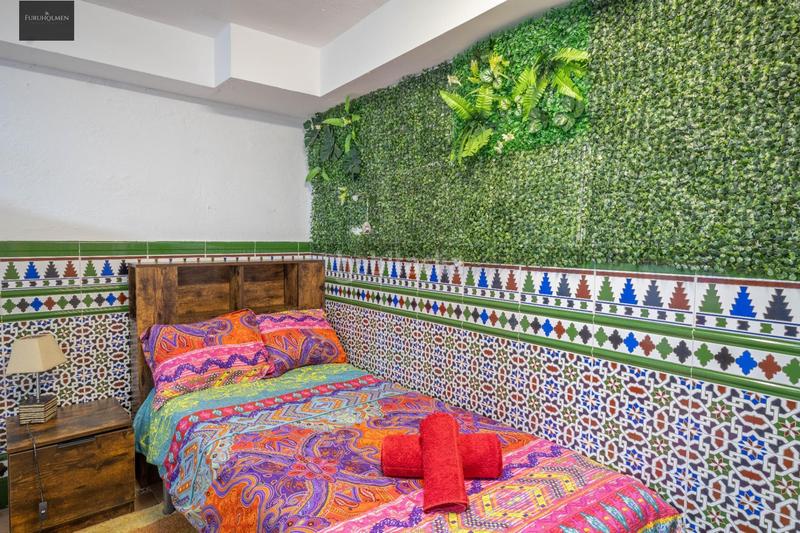 Foto 3a7e2c10-85fa-4650-a617-7229d0015518. Casa a schiera con riscaldamento in Barrio de Albaicín Granada