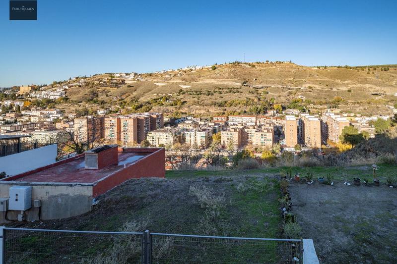 Foto 1bf720be-d274-4d9f-ad07-7eae2b36fec2. Casa adossada amb calefacció aparcament a Camino de los Neveros - Serrallo Granada