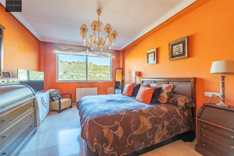 Foto 8df6b7bc-55a9-41dc-a103-c42c19ad3ead. Casa adossada amb calefacció aparcament a Camino de los Neveros - Serrallo Granada