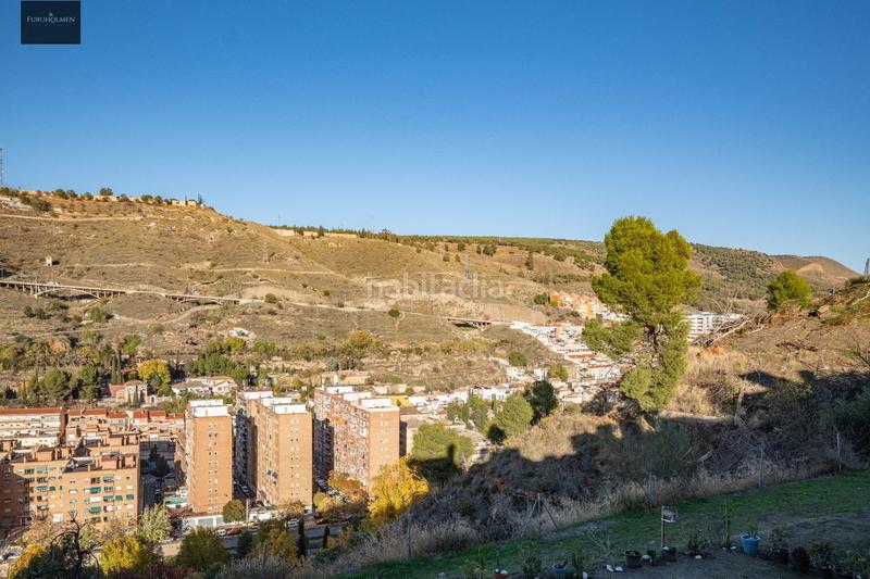Foto ceaa4212-f11d-44e0-9951-5cfcd905cc96. Casa adossada amb calefacció aparcament a Camino de los Neveros - Serrallo Granada