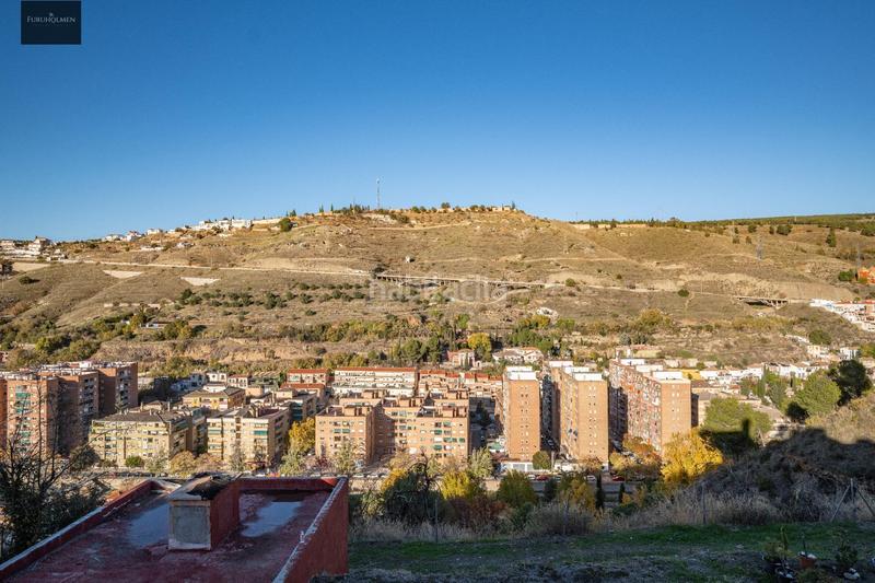 Foto f2243110-72f3-4a65-b825-0617dcca6807. Casa adossada amb calefacció aparcament a Camino de los Neveros - Serrallo Granada