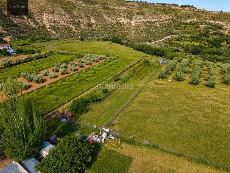 Foto fa331b12-31da-42d3-9d6f-29837e696c30. Masia amb aparcament a Monachil pueblo Monachil