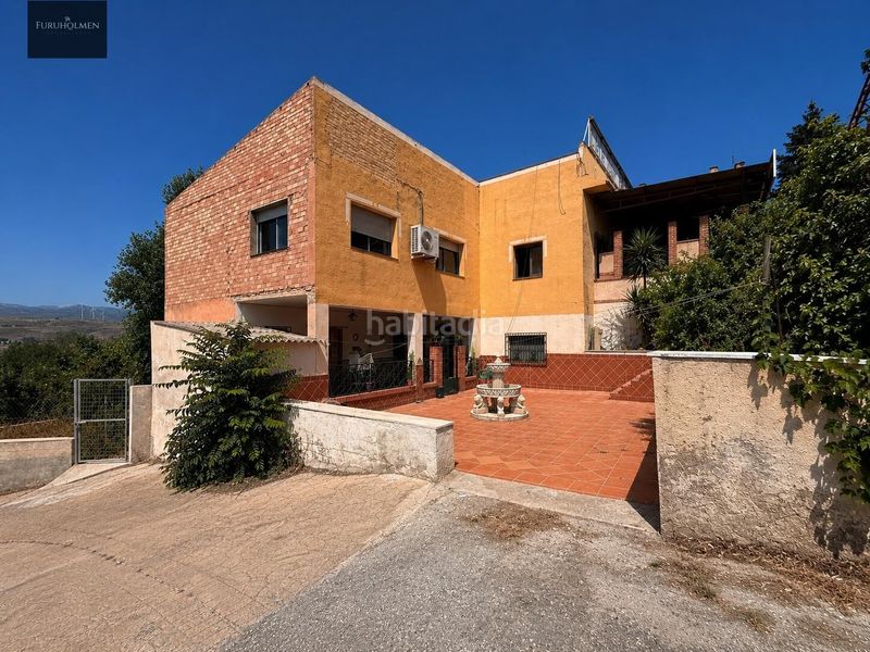Foto f24c601f-5b1a-417f-b1c8-3b95981cef61. Edifici a Padul