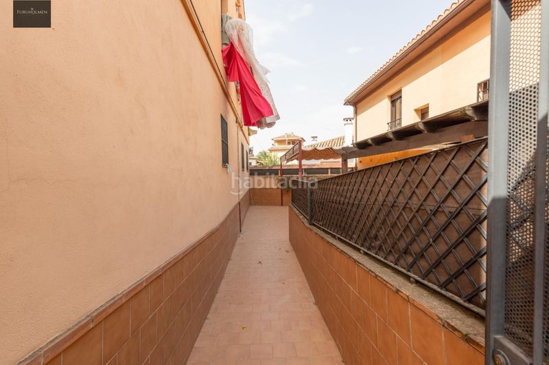 Foto 3020ce3e-02a0-4a7e-97d2-695e1a108f14. Casa aparellada amb calefacció aparcament a Barrio de la Vega Monachil