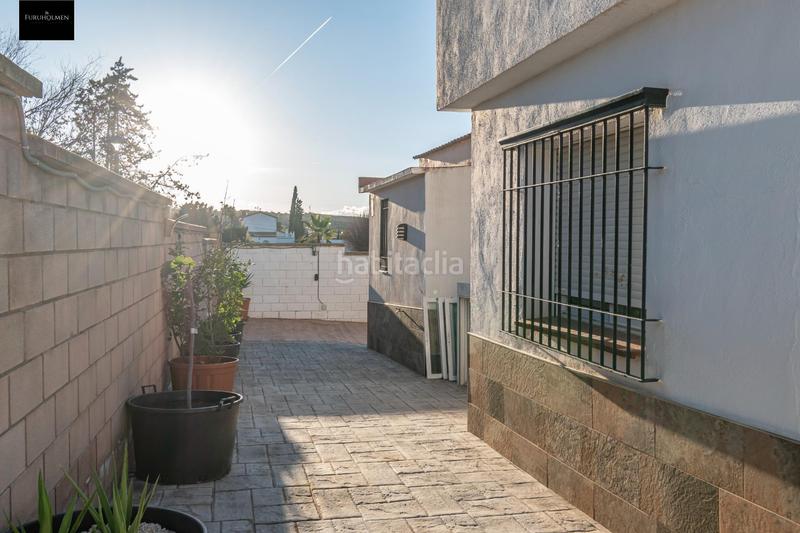 Foto ad0ba322-e8fc-4003-a636-44c254c4bc26. Chalet preciosa casa totalmente reformada en suspiro del moro, en Otura