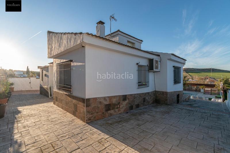 Foto b1abac6a-6f48-4169-a179-532cbc46a3b0. Chalet preciosa casa totalmente reformada en suspiro del moro, en Otura