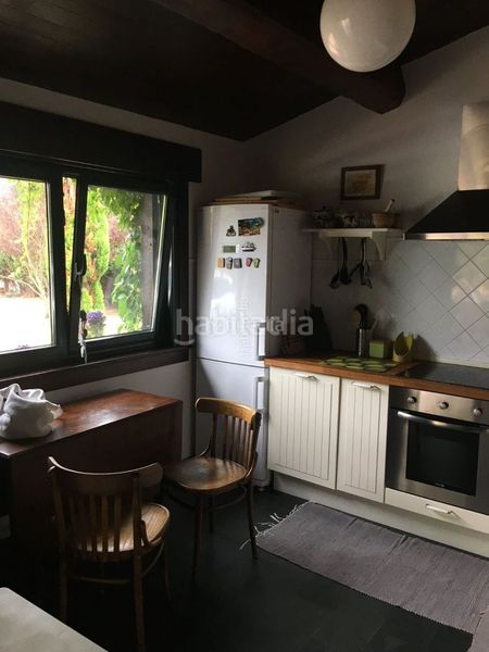 Foto fa8a2874-2e49-4419-8341-213d446c6de1. Chalet in lugar canelas 8 in Xove