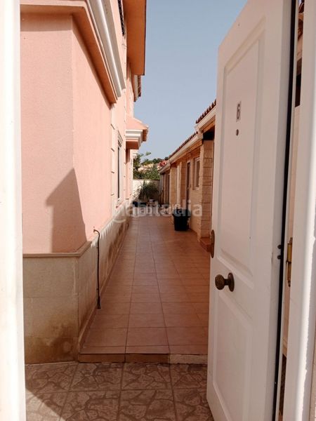 Foto b5bbed0c-d943-42d1-b2b2-83fca55ae408. Casa adossada a avenida de malta 15a a Sierra Helada Benidorm