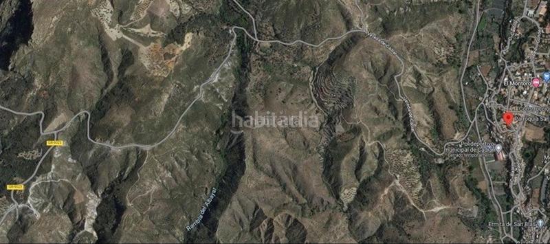Foto f0d64b0d-9b9e-450d-9d9c-b97471f99b00. Finca rústica en calle nueva apertura 2 conjunto de 6 parcelas con olivos y cortijo en Cádiar