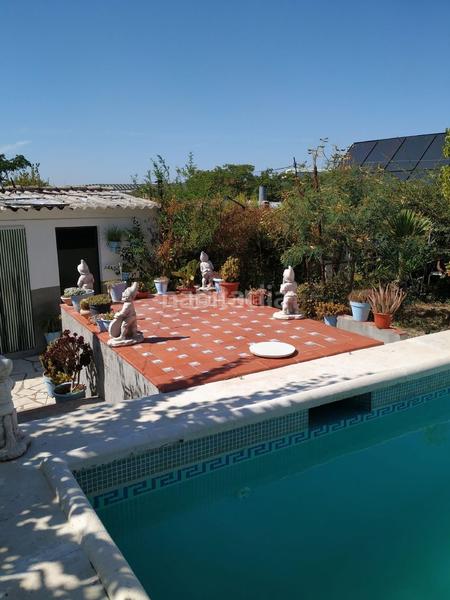 Foto 8c525183-b344-48f9-817e-51d4092eddef. Chalet en calle luciano 97 chalet con piscina en Nueva Carteya