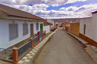 Casa a Calle san juan 8d. Casa con patio y suite en huélago