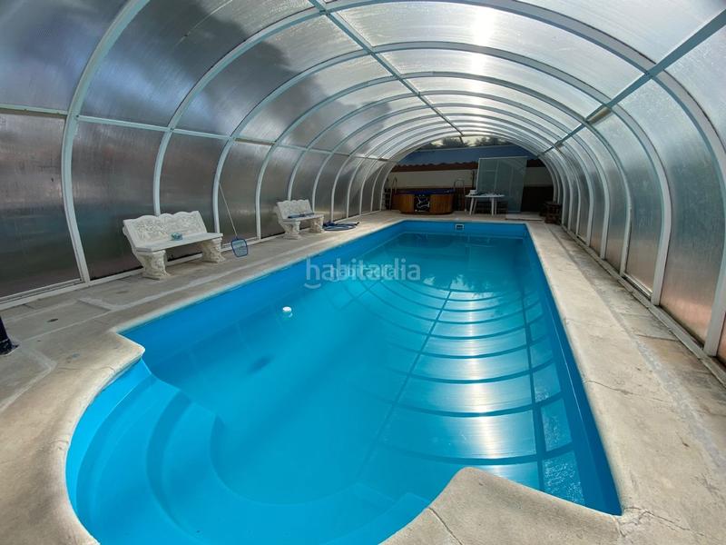 Foto 50e12769-c1d3-4cfb-8487-d0c0f4f3d442. Casa in calle ronda de manchester 290 in Eurovillas Nuevo Baztán