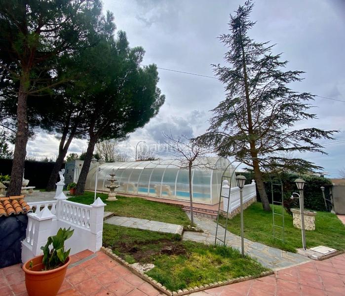 Foto 91351dc6-57e3-44a9-9944-d8e30bee18a5. Casa in calle ronda de manchester 290 in Eurovillas Nuevo Baztán