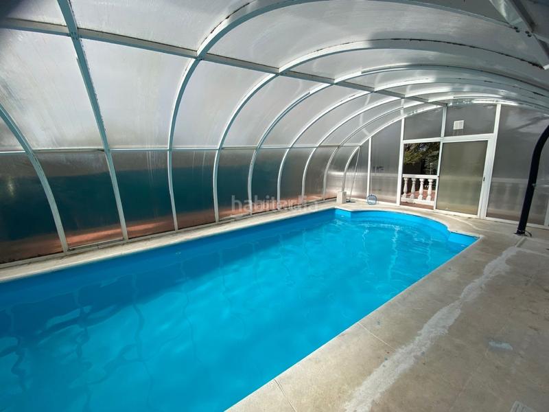 Foto c8f24a6a-5ce3-4022-bf5e-5186ac669407. Casa in calle ronda de manchester 290 in Eurovillas Nuevo Baztán