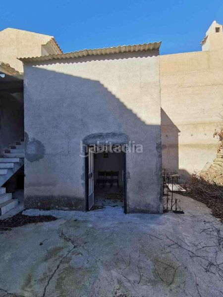 Foto 61260cf4-075d-4eda-bc18-95271ce1a468. Semi detached house in calle granada 1 in Cortes de Baza