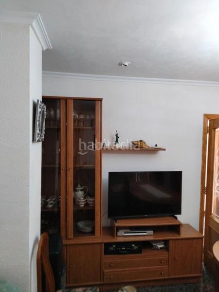 Foto 1eefa82e-e5e0-44ac-9e43-1bcb213366a2. Casa adossada a carrer mediterrani 22 a Mareny Blau Sueca
