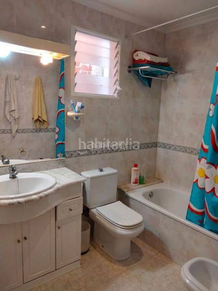 Foto 9765f739-b775-4ef4-872c-c6a0bb5098e6. Casa adossada a carrer mediterrani 22 a Mareny Blau Sueca