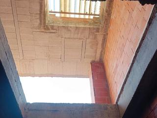 Casa adossada a Eulalia escobet 32. Vivienda unifamiliar entre medianeras