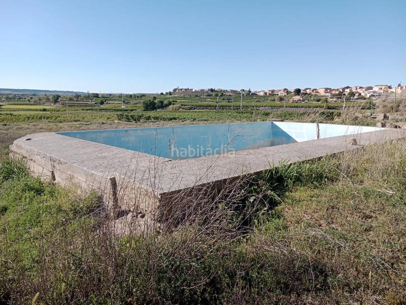Foto 405ad001-6e61-4b1d-ad9f-663da813c632. Casa en lp-9221 12 finca rústica con construccion en Portella (La)
