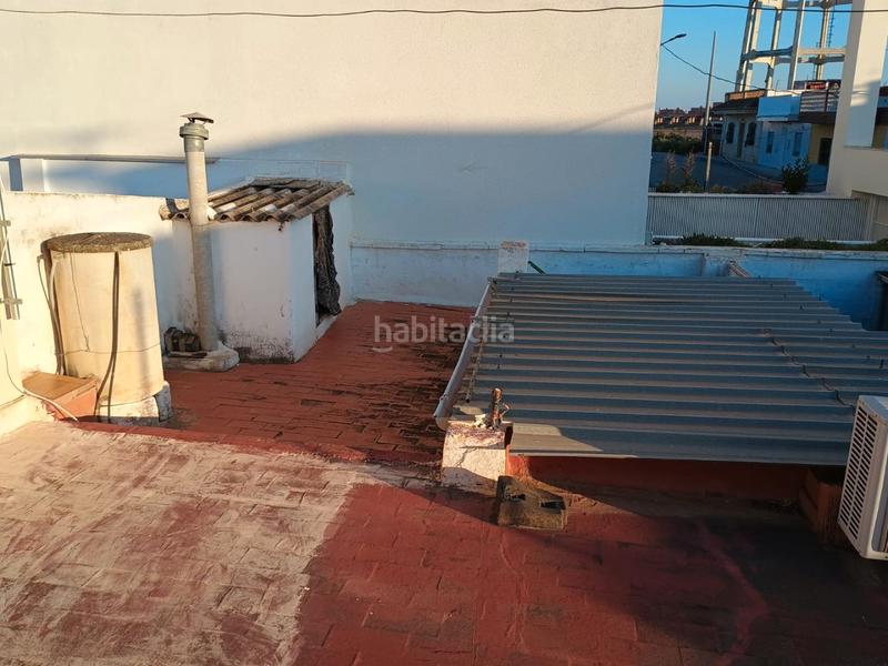 Foto 7691c551-3c34-4cbb-b058-54b523a1e3ec. Casa en calle sevilla 55 casa baja con terraza muy grande y patio interior en Picassent