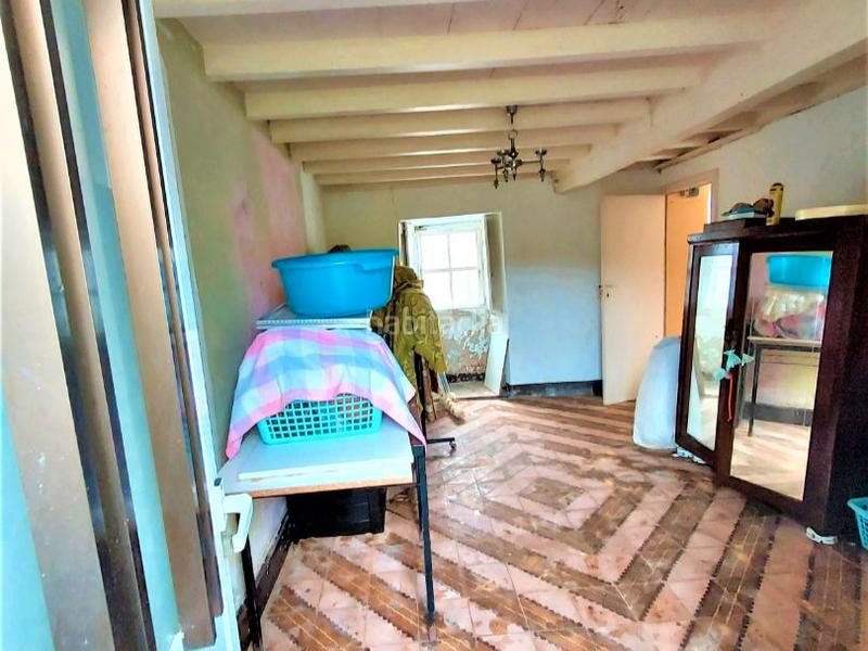 Foto d42e0e07-a069-448e-a850-04388d638639. Casa adossada a sixto 15 a Camariñas