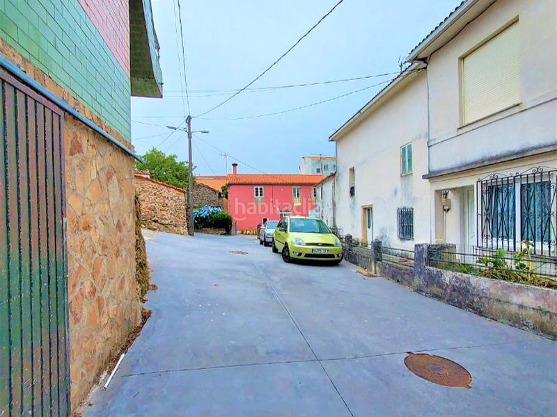 Foto f21618e6-20d2-4218-85bc-4e58526dc690. Casa adossada a sixto 15 a Camariñas