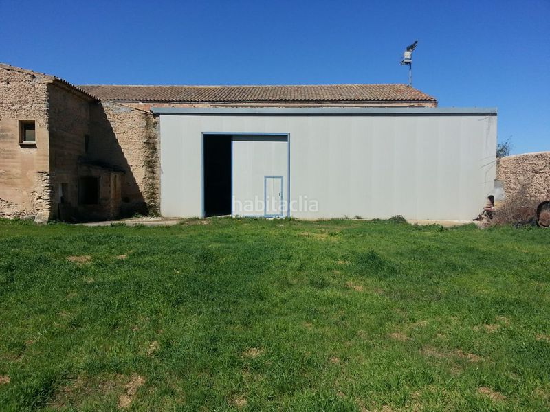 Foto 7b2267a9-f6d3-4649-b527-651fde9e6cec. Solar industrial en cami l'eral 5 venta de terreno con nave en Vilanova de Bellpuig