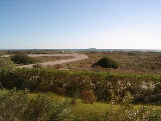 Appartement à Avda. gola del puchol  13. Apartamento en 1ª linea de playa el saler con pinada y lagos