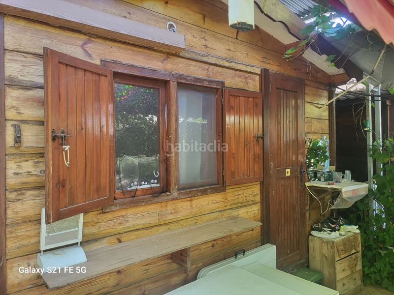 Foto 02fe1202-0f6d-4bc4-9417-043c38503ce2. Masía en avenida de circunvalación 410 casita de madera en 70 metros de parcela en Daganzo de Arriba