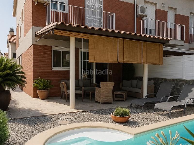 Foto 01ba0e33-2211-4ed1-9631-beb076ad29f3. Casa adosada en salvador espriu 1 "casa exclusiva con piscina, jardín, buhardilla y máxima seguridad" en Ripollet