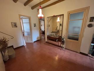 Casa adossada a Esglesia 9. Casa de 3 plantas