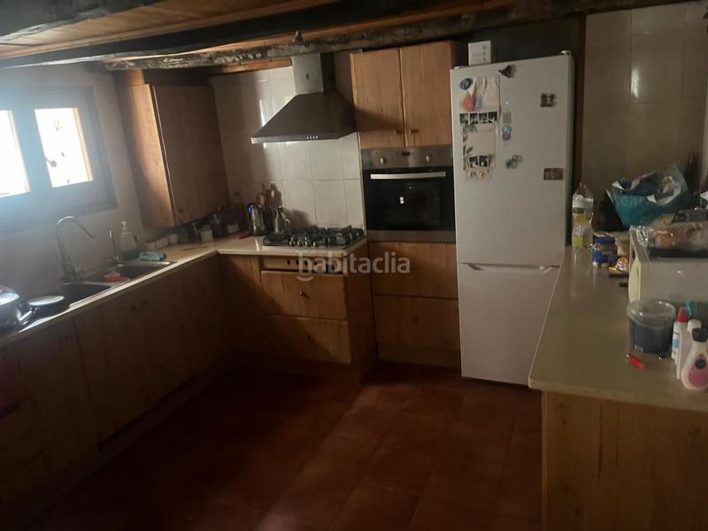 Foto fad1fc63-45a3-41e1-8408-81d1c2ffc08a. Masia a veinat sant marti 32 a Santa Pau