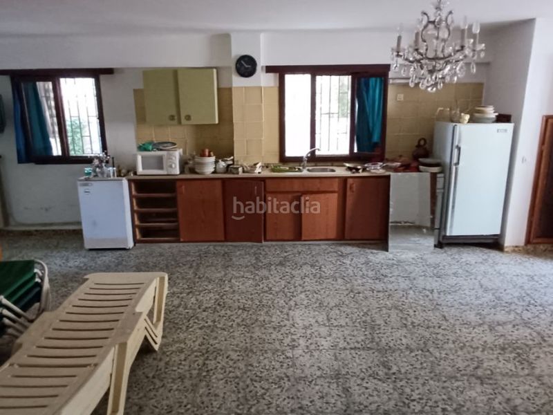Foto f0f0c312-101d-49f5-8ed0-d4c2e9934b2b. Casa en calle andalusia 18 magnífica villa con piscina y gran potencial en Lloret de Mar