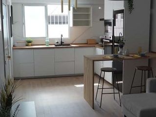Appartamento in Ample 52. Planta baja con patio de 50m2