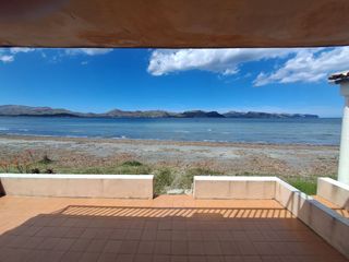 Casa adossada a Canet del rosselló 9. Casa frente al mar en sa marina, alcúdia con terraza sobre la ar
