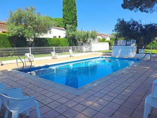Apartment in Carrer del palau 75. Joli appartement dans un quartier calme avec piscine commune à l
